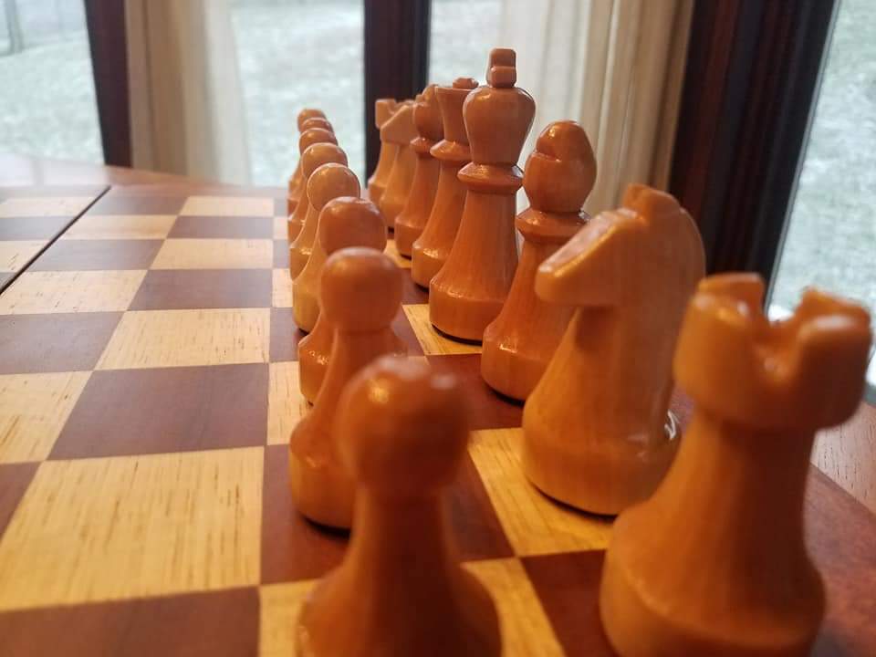 Hand carved chess set by silent sports